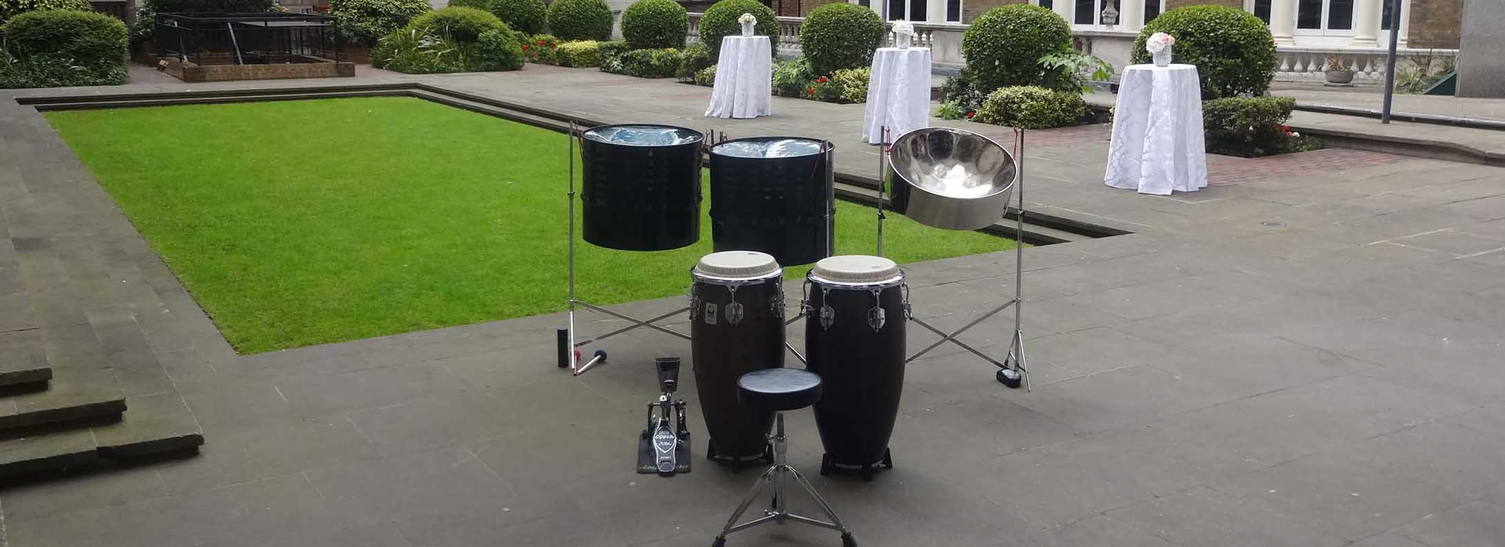 Colourful steel drum band performing, showcasing top-quality entertainment for parties and events at steelbandhire.com.